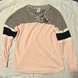 Pink XS shirt.  Pink with gray, blackk and white